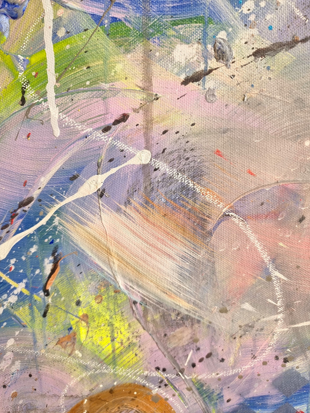 Abstract artwork with colorful brush strokes on a textured surface