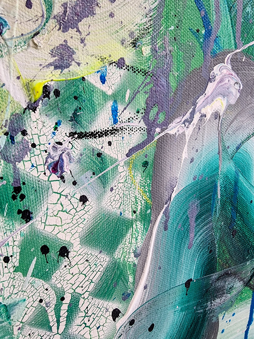 Abstract artwork with a mix of green, blue, and purple colors.