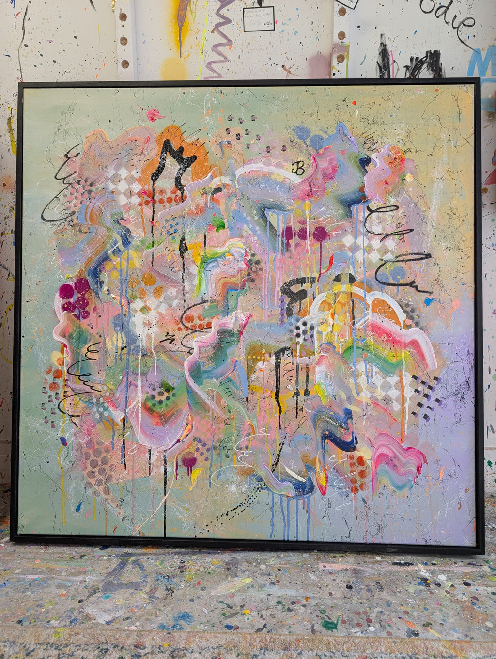 Abstract artwork with colourful splashes on a textured surface