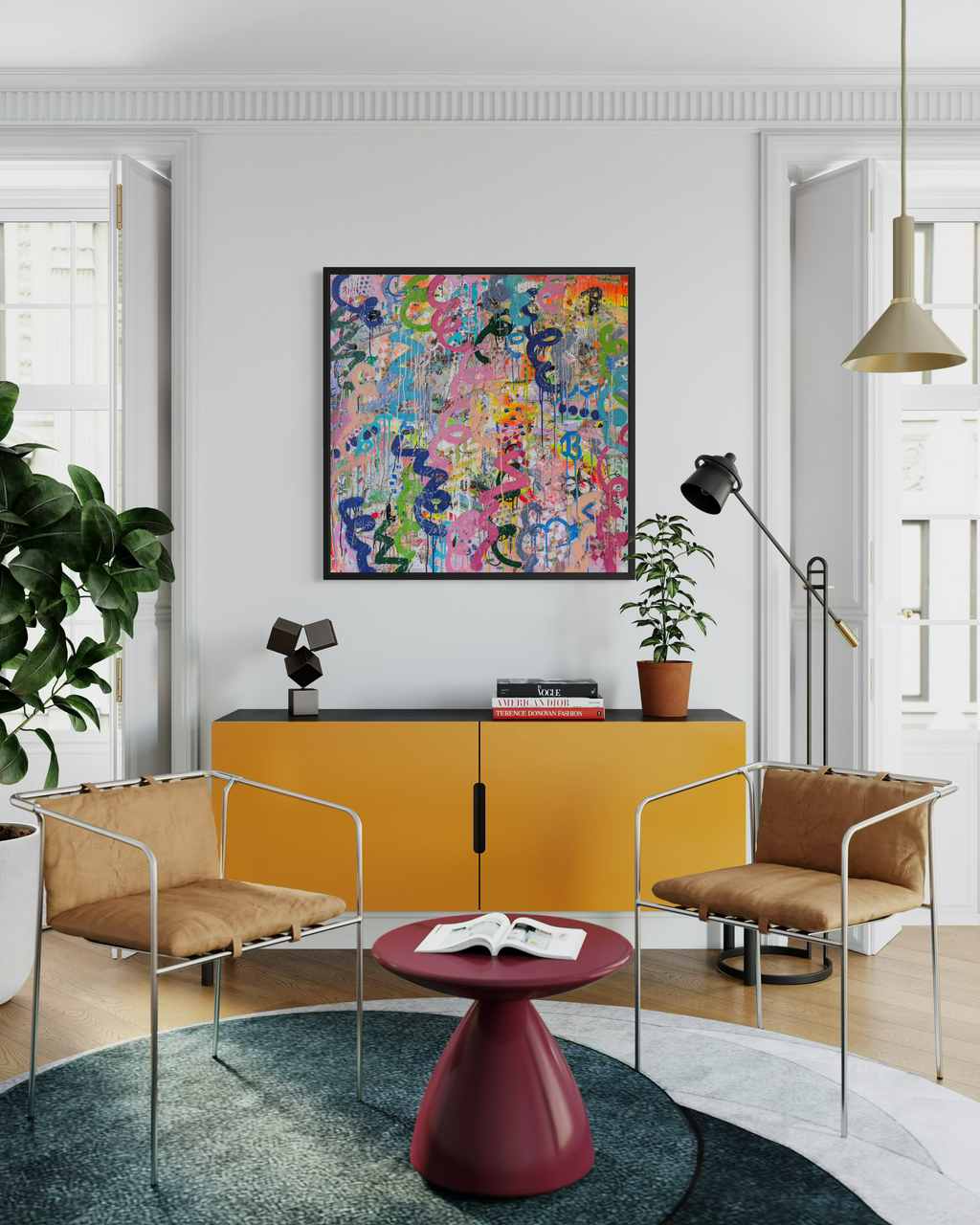 Modern living room with yellow cabinet, colourful abstract art, and stylish chairs.