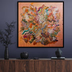 Abstract painting on a wall above a wooden cabinet with decorative items.