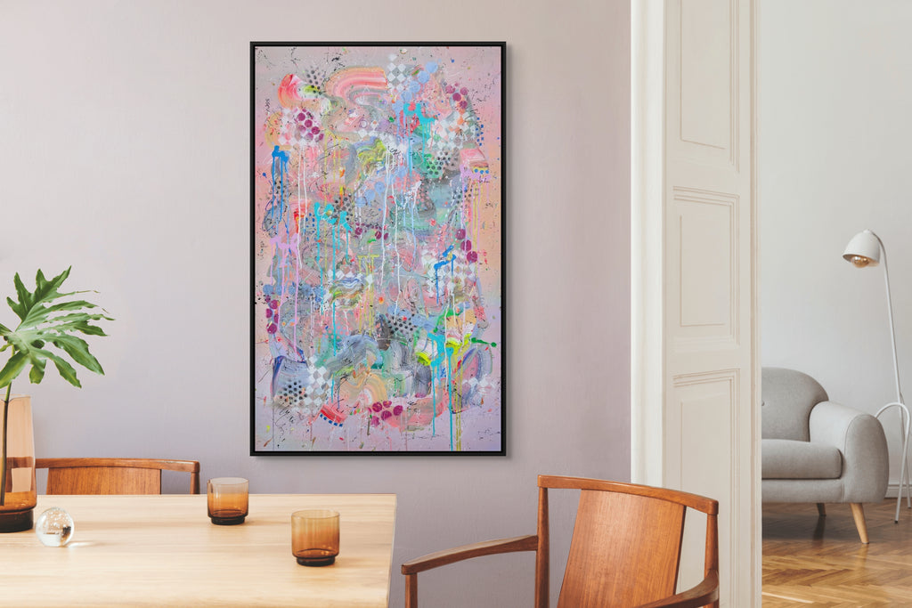 Colorful abstract painting on a wall in a modern living room.