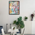 Modern interior with a colorful abstract painting on the wall, white table, chairs, and plants.