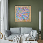 Modern living room with a gray sofa, abstract painting, and white coffee table.